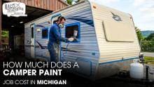 A Male Technician is Painting a Jayco Camper Exterior