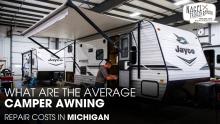 A Technician Checking A Jayco Camper's Awning inside A Workshop