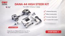 Chevy Dana 44 crossover steering kit with EWO flat top knuckles, 1.25 inch billet arms, tie rod ends, and steering hardware.