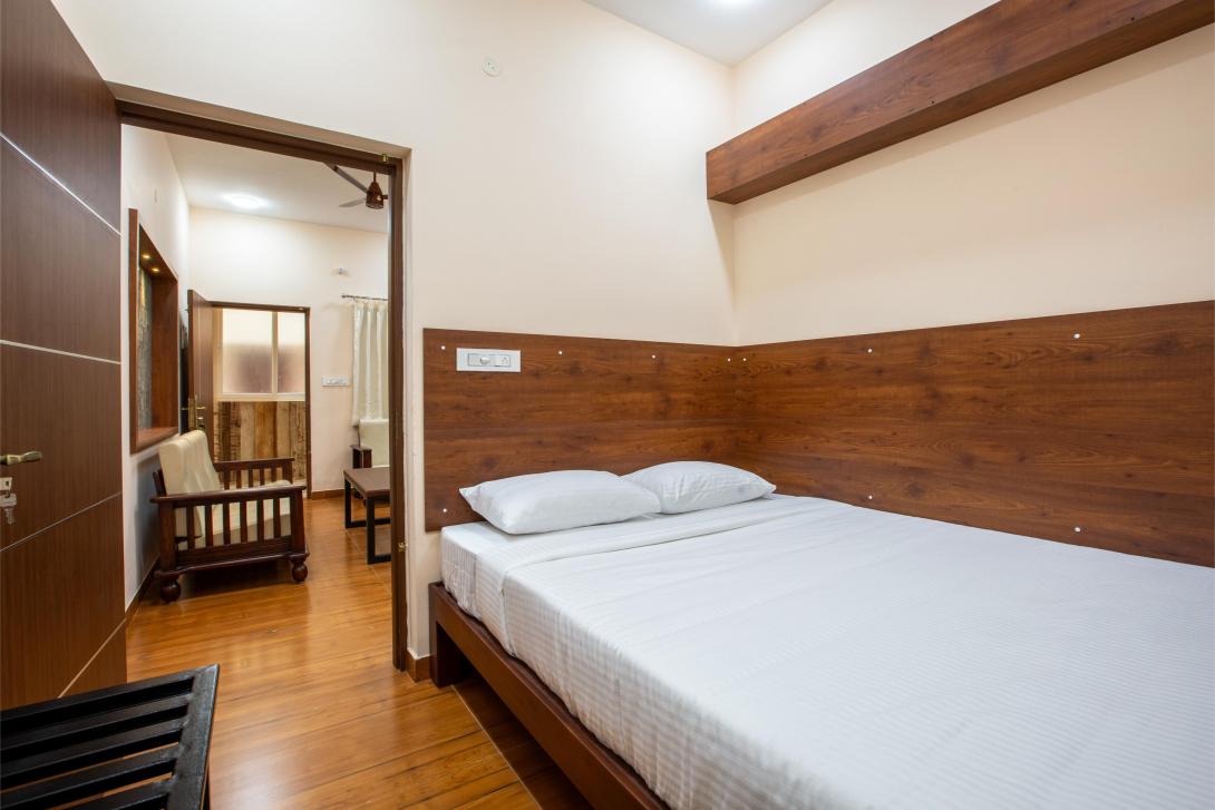Mugundan's Smart Stay offers premium business travel accommodation in Coimbatore, ranked among the best hotels for business trips in Coimbatore.